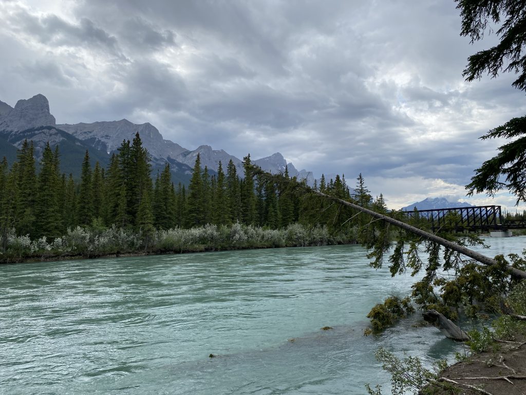 Canmore, Alberta. Mountain view with light blue river.