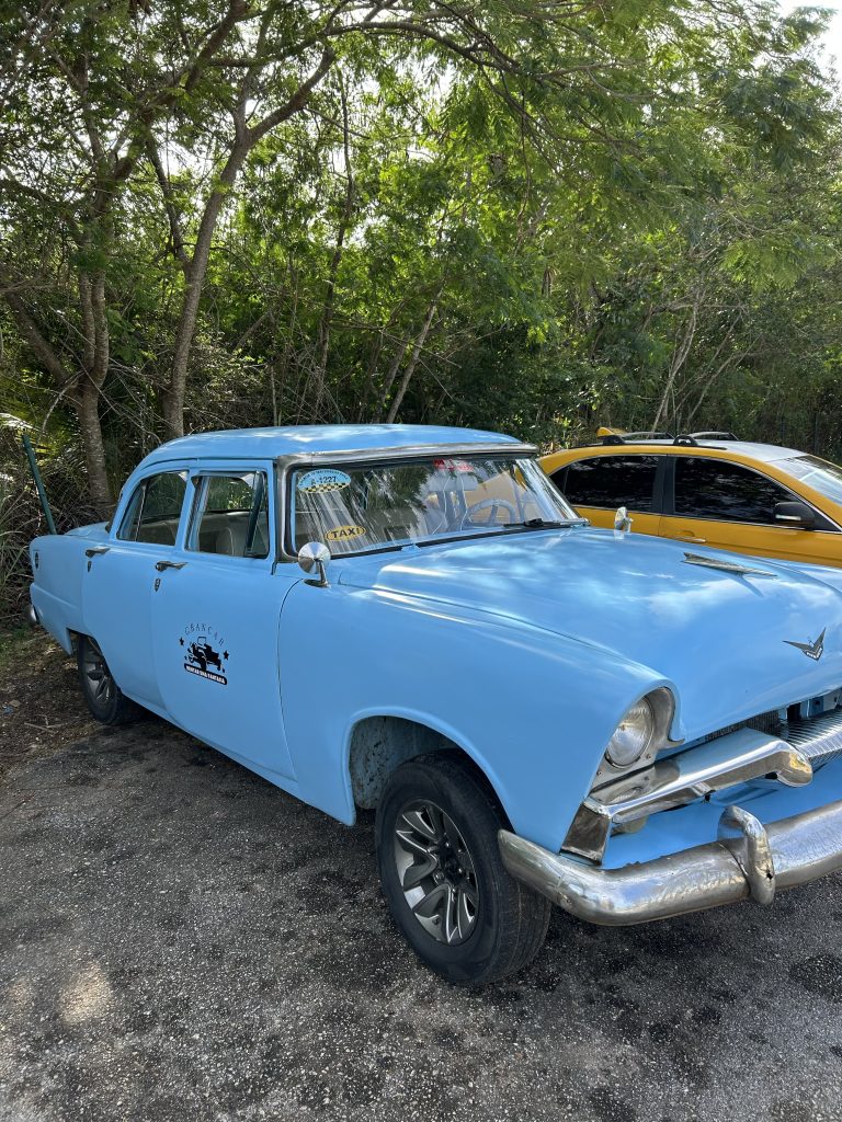 Blue classic car taxi