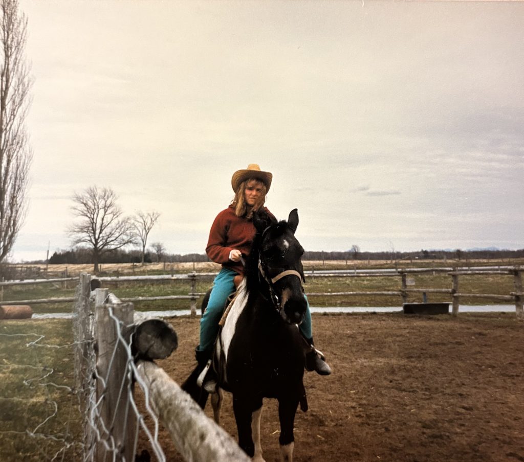Teen riding horse