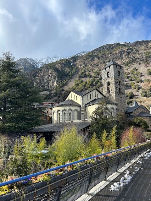 stone church in front of mountains