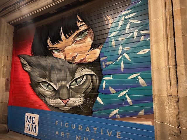 girl and cat painting on door