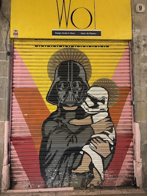 Darth Vader holding baby storm trooper n religious pose