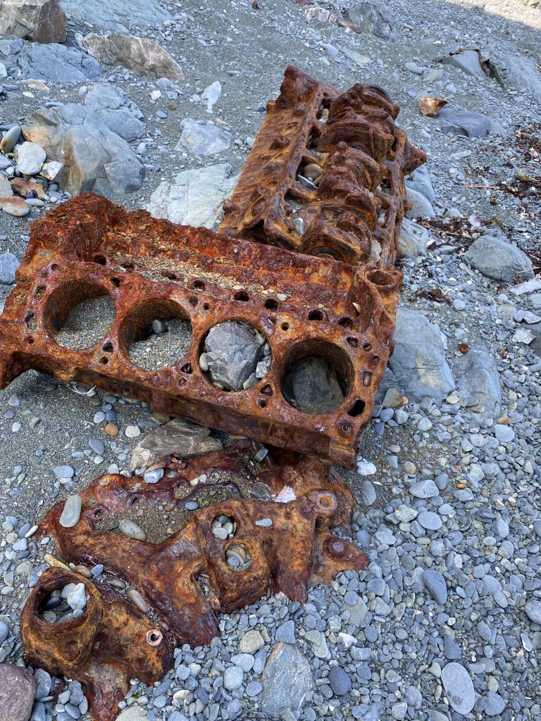 old rusty ship parts on beach